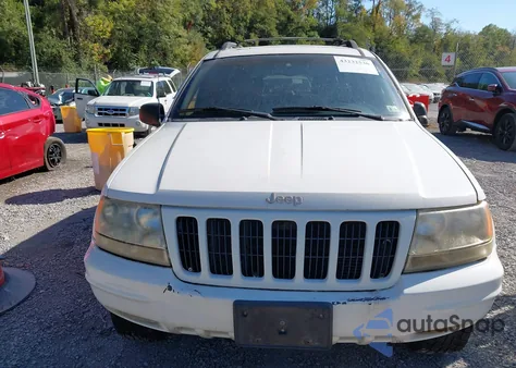 1999 Jeep Grand Cherokee Limited from USA, damaged, VIN 1J4GW68N2XC547533